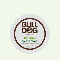 A round white container of Original Beard Wax, made with natural origin ingredients for moisturising and styling beards and moustaches. The 50g lid displays brown and green text.